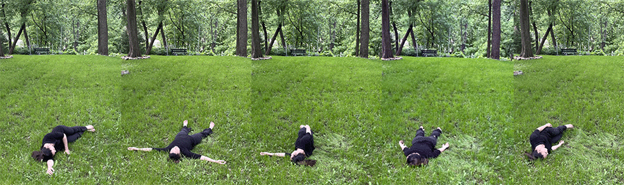 Kelly lays in a field to demonstrate how to roll and pour.